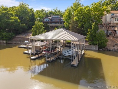 Experience true Lake of the Ozarks living at this exceptional - photo 2