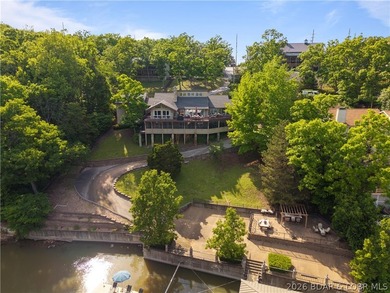 Experience true Lake of the Ozarks living at this exceptional - photo 3