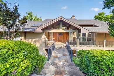 Experience true Lake of the Ozarks living at this exceptional - photo 4