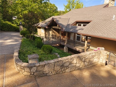Experience true Lake of the Ozarks living at this exceptional - photo 5