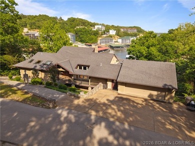 Experience true Lake of the Ozarks living at this exceptional - photo 6