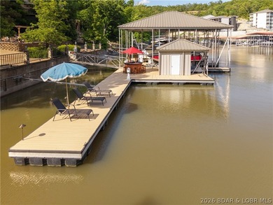 Experience true Lake of the Ozarks living at this exceptional - photo 7