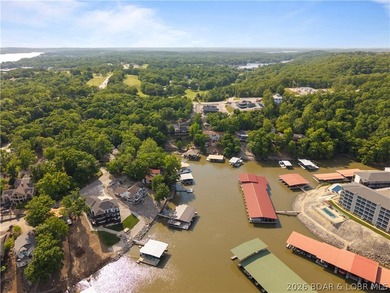 Experience true Lake of the Ozarks living at this exceptional - photo 8