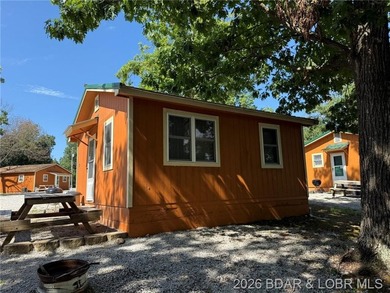 Cabin 10 is a single room with full kitchen, range with oven and - photo 2