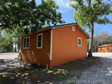 Cabin 10 is a single room with full kitchen, range with oven and - photo 3