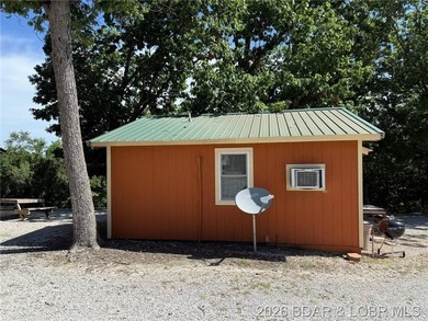 Cabin 10 is a single room with full kitchen, range with oven and - photo 4