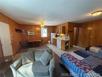 Cabin 10 is a single room with full kitchen, range with oven and - photo 6