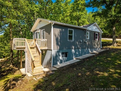 Beautifully updated 2-bedroom home sits on a nearly half-acre - photo 1