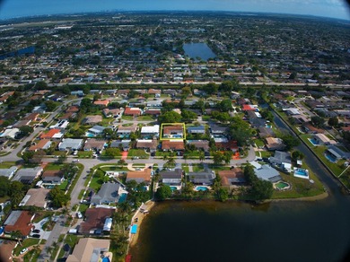 This beautifully maintained 4/2 pool home offers just under 2 - photo 12