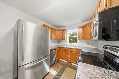 Beautifully updated 2-bedroom home sits on a nearly half-acre - photo 4