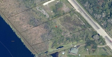 Prime waterfront property featuring 2 acres on the Rim Canal - photo 2