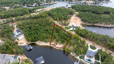 Offering almost 5 acres and 220' of shoreline, this double lot - photo 4
