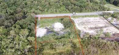 Prime waterfront property featuring 2 acres on the Rim Canal - photo 5