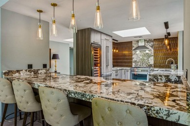 Nestled within the prestigious Springs Country Club, this - photo 12