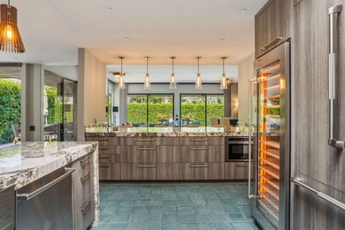 Nestled within the prestigious Springs Country Club, this - photo 16