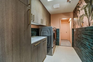 Nestled within the prestigious Springs Country Club, this - photo 44