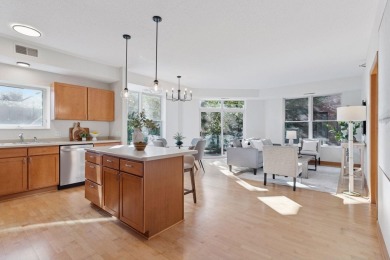 Step into this beautifully updated corner unit featuring fresh