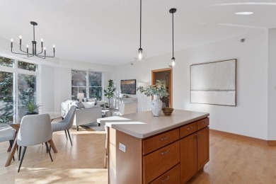 Step into this beautifully updated corner unit featuring fresh