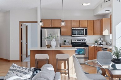 Step into this beautifully updated corner unit featuring fresh