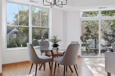 Step into this beautifully updated corner unit featuring fresh