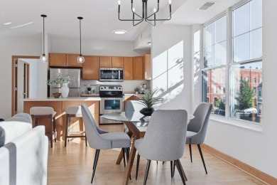 Step into this beautifully updated corner unit featuring fresh