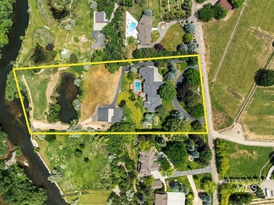 Nestled on a sprawling 4.5-acre estate, this breathtaking - photo 2