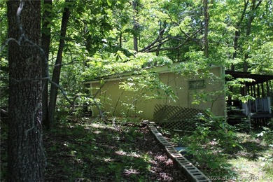 Fixer-Upper Opportunity on Wooded .63 Acre Lot Back on market at - photo 5