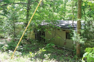 Fixer-Upper Opportunity on Wooded .63 Acre Lot Back on market at - photo 7