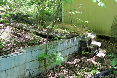 Fixer-Upper Opportunity on Wooded .63 Acre Lot Back on market at - photo 10