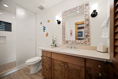 This is a leasehold property. Top-floor, end unit 1-bedroom - photo 12