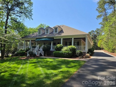 This Badin Lake area lot is located in the prestigious gated - photo 13
