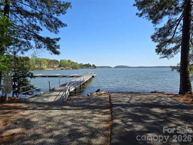 This Badin Lake area lot is located in the prestigious gated - photo 14