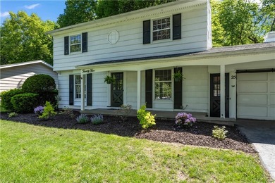 Beautifully updated 4-bedroom, 1.5-bath Colonial nestled on a - photo 4