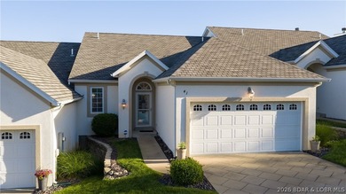 Come home to this inviting, welcoming villa at The Palms in Lake - photo 1