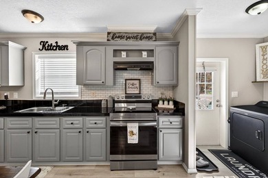 This 3-bedroom, 2 bath home has been completely updated, open - photo 2