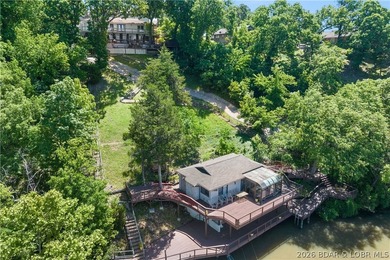 Don't miss this incredible lakefront opportunity featuring a - photo 1