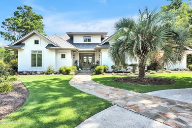 Peacefully positioned along the shores of Howe Creek, this - photo 1