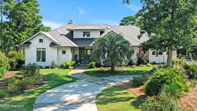 Peacefully positioned along the shores of Howe Creek, this - photo 2