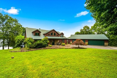 Stunning log home on the main channel of Douglas Lake! This - photo 3