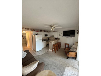 Enjoy Lake of the Ozarks living in this well-maintained 1 bed, 1 - photo 2