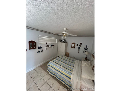Enjoy Lake of the Ozarks living in this well-maintained 1 bed, 1 - photo 5