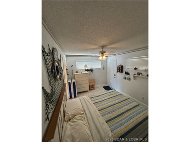 Enjoy Lake of the Ozarks living in this well-maintained 1 bed, 1 - photo 8