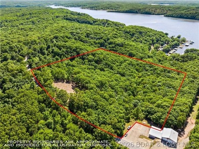 Perched above the Lake of the Ozarks with impressive views and a - photo 5