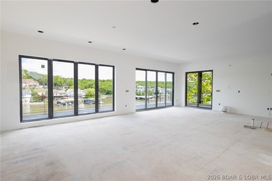 Experience elevated lake living at Harper's Cov! An exceptional - photo 2