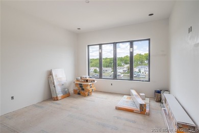 Experience elevated lake living at Harper's Cov! An exceptional - photo 5