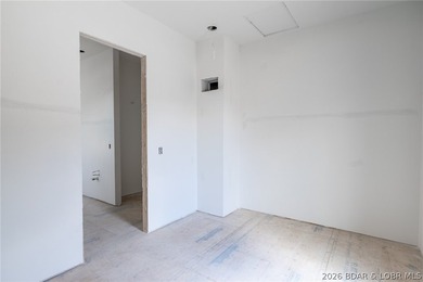 Experience elevated lake living at Harper's Cov! An exceptional - photo 6