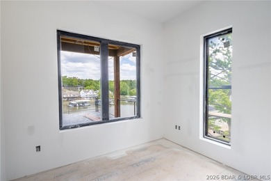 Experience elevated lake living at Harper's Cov! An exceptional - photo 7