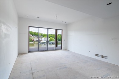 Experience elevated lake living at Harper's Cov! An exceptional - photo 9