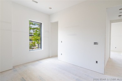 Experience elevated lake living at Harper's Cov! An exceptional - photo 10