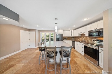 This updated 4-bedroom lakefront condo on Horseshoe Bend - photo 8